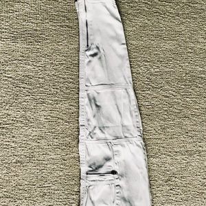 White jeans with gold zippers